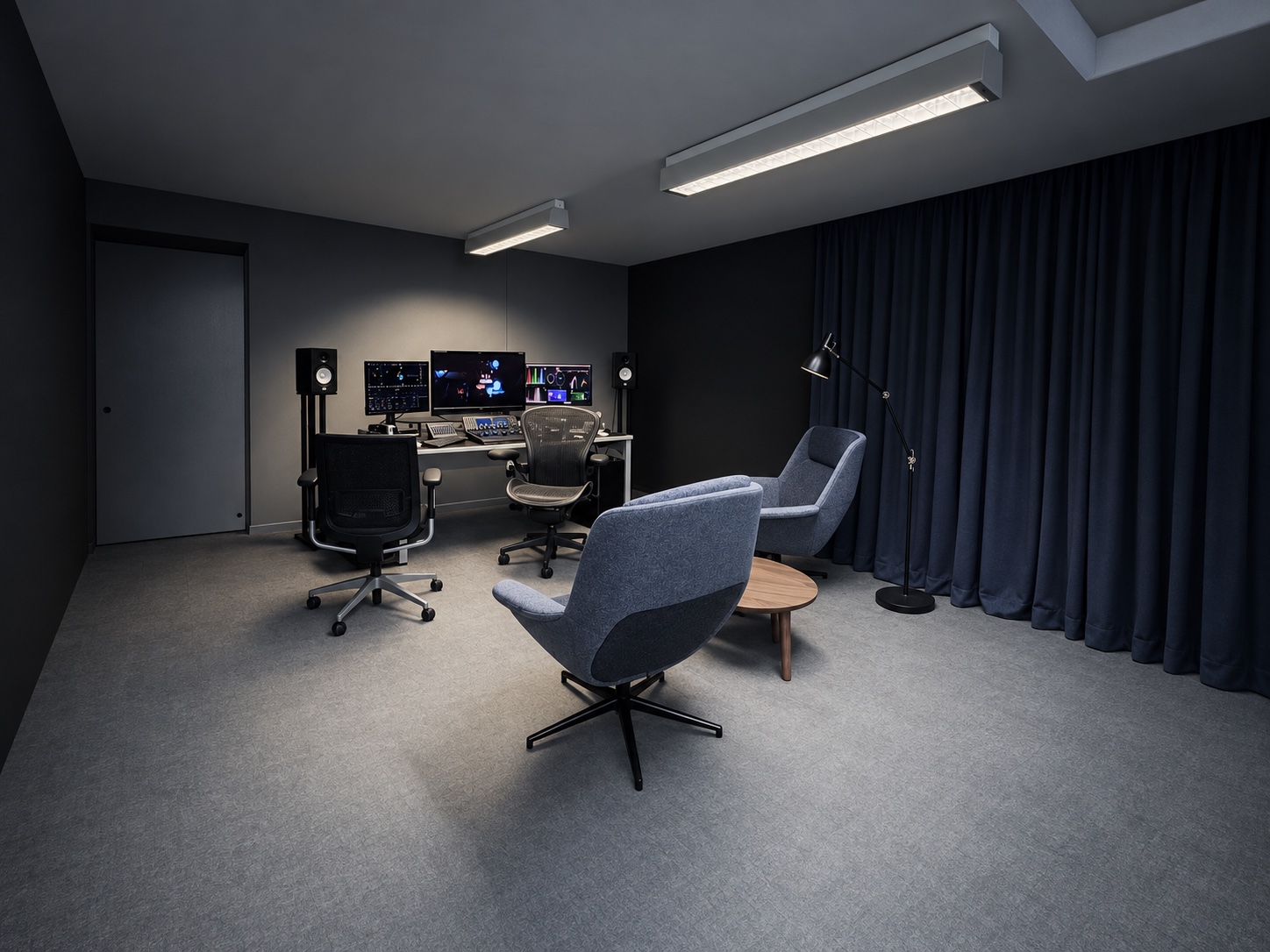 The Cave grading suite with a three-monitor workstation and client seating